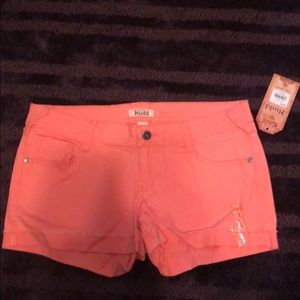 Shell pink short shorts.